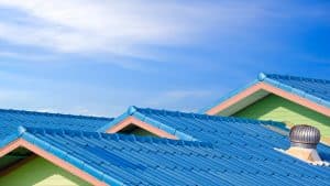 Blue fiber cement tile roofs in different level wi - roofing