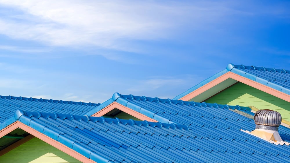 Blue fiber cement tile roofs in different level wi - roofing